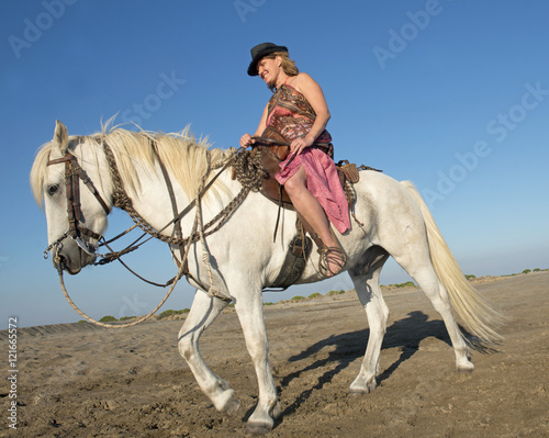 Fototapeta Naklejka Na Ścianę i Meble -  horse woman on the beach