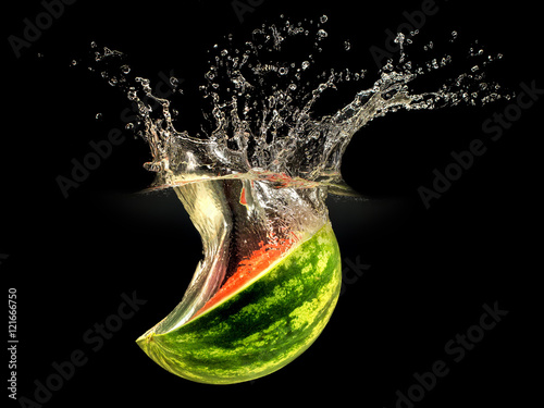 Fresh melon falling in water with splash on black background