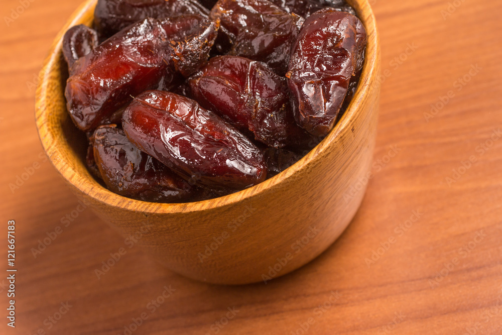 Dried Dates into a bowl. Tamara Dried Dates into a bowl. Tamara