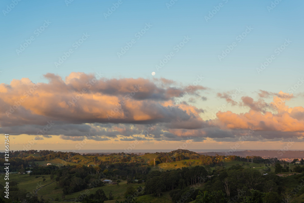 Golden sunset with the litte moon