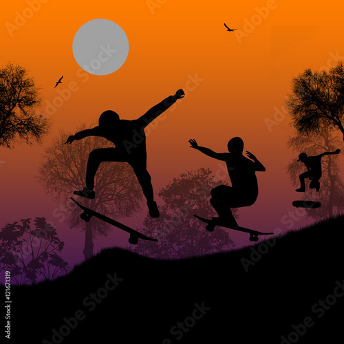 Skater silhouettes on park