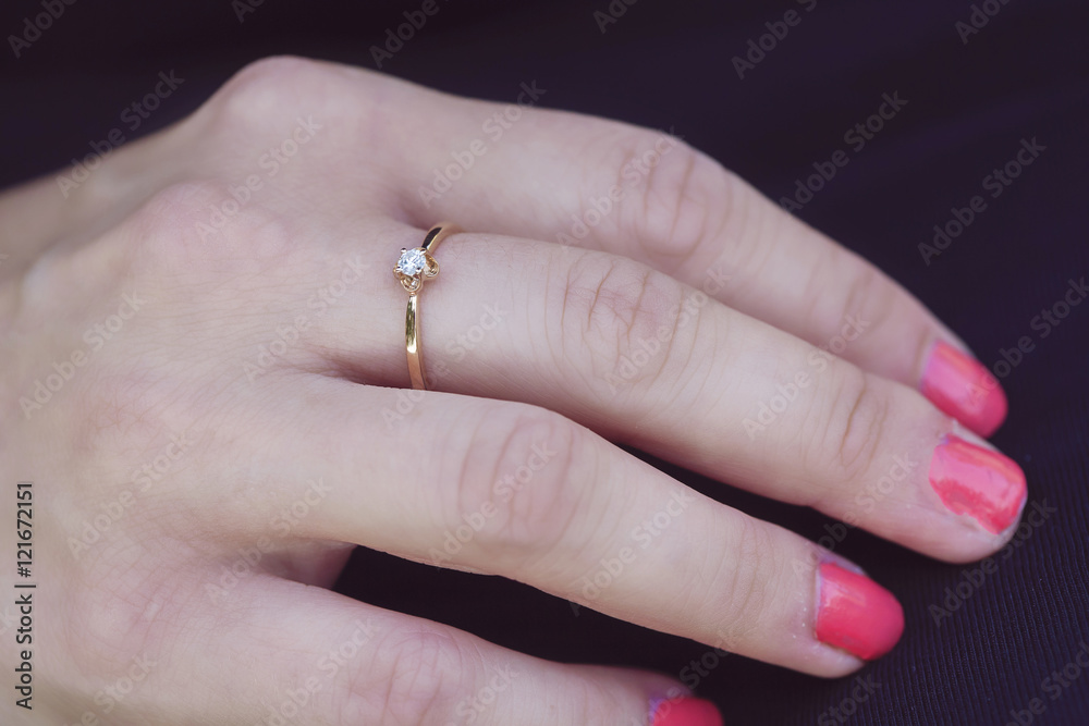 woman's hand with beautiful engagement ring