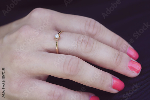 woman s hand with beautiful engagement ring