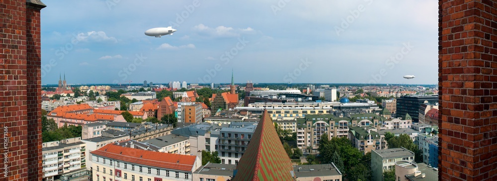 Panoramic cityscape of Wroclaw at sunny summer day. Church Maria Magdalena wiev point, Poland. Panoramic cityscape of Wroclaw at sunny summer day. Church Maria Magdalena wiev point, Poland.