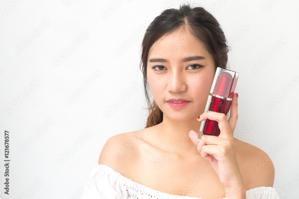 beautiful woman applying cosmetic cream,solated with clipping pa beautiful woman applying cosmetic cream,solated with clipping pa