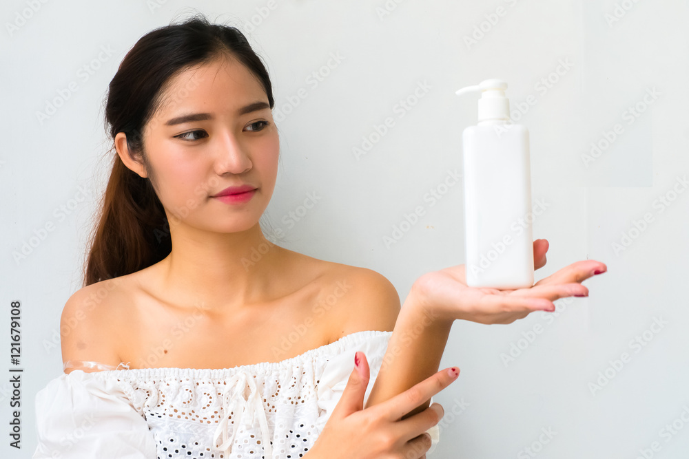Body lotion Portrait of Beautiful Woman looking at Camera. Beau Body lotion Portrait of Beautiful Woman looking at Camera. Beau
