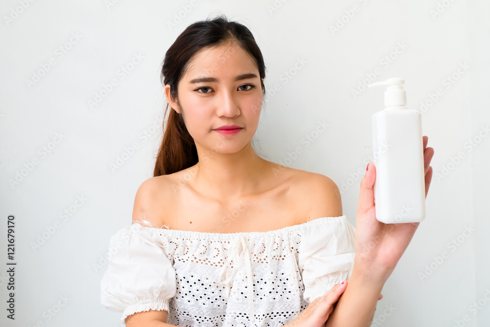 Body lotion Portrait of Beautiful Woman looking at Camera. Beau Body lotion Portrait of Beautiful Woman looking at Camera. Beau