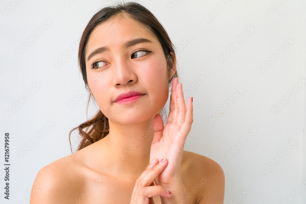 The Portrait of a beautiful female model on white background