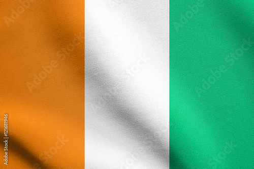 Flag of Ivory Coast waving with fabric texture