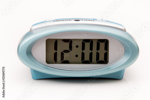 Digital clock displaying 12:00 o'clock on a white background
