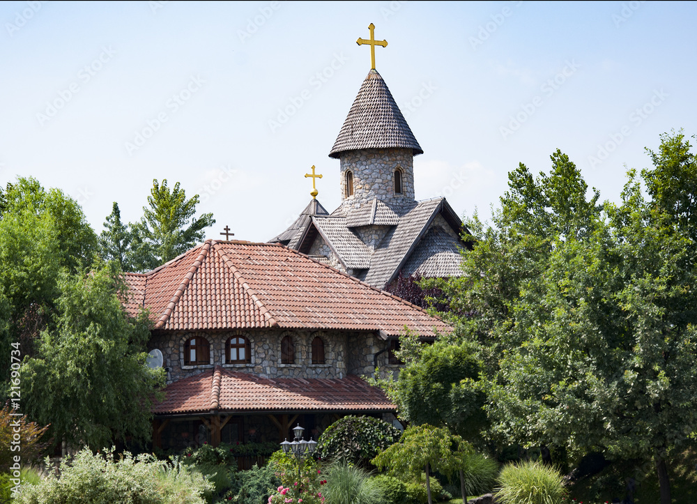 church against the background of trees in Stanisici Bosna and Hercegovina