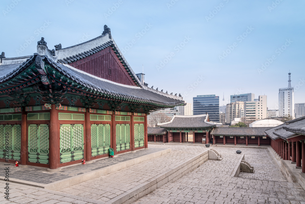 SEOUL, SOUTH KOREA - MARCH 04: The view of Gyeonghui Palace in foreground and Seoul city in background on March 04, 2014 SEOUL, SOUTH KOREA - MARCH 04: The view of Gyeonghui Palace in foreground and Seoul city in background on March 04, 2014