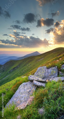Mountain valley during sunset. Natural summer landscape