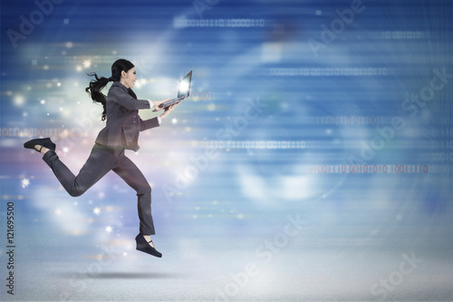 Businesswoman running in virtual world