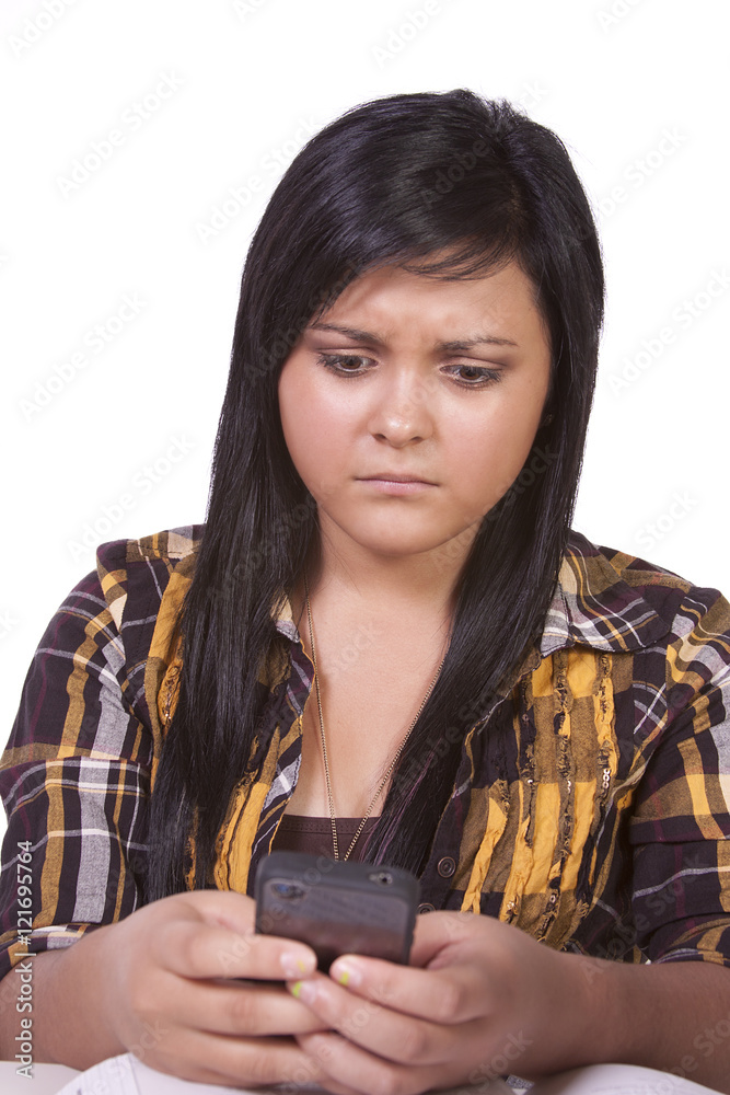 Concerned Teenage Girl Texting Concerned Teenage Girl Texting