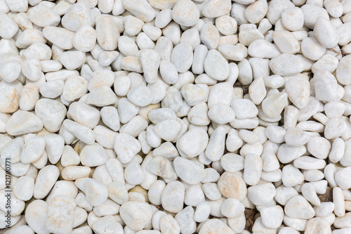 Natural white marble sea stones texture background.