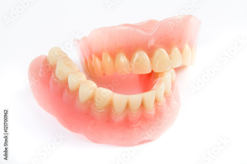 Dental smile jaws teeth on white background. Tooth prosthesis.