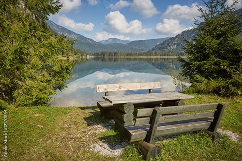 Picnic table and bench at lake Offensee in Salzkammergut