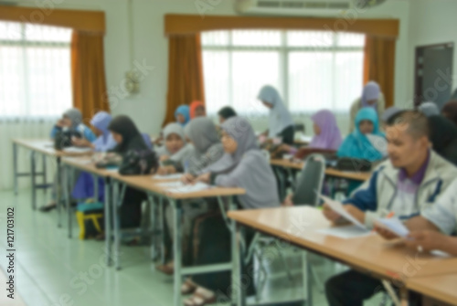 blur image of adult asian muslim education