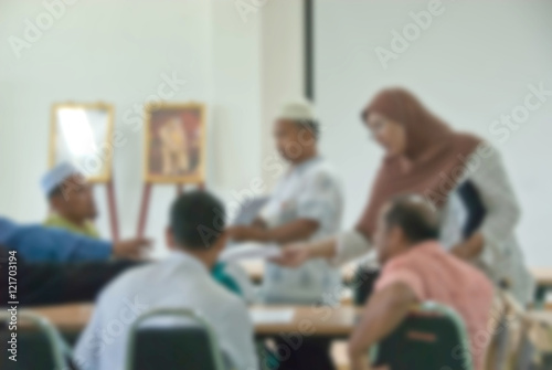 blur image of adult asian muslim education