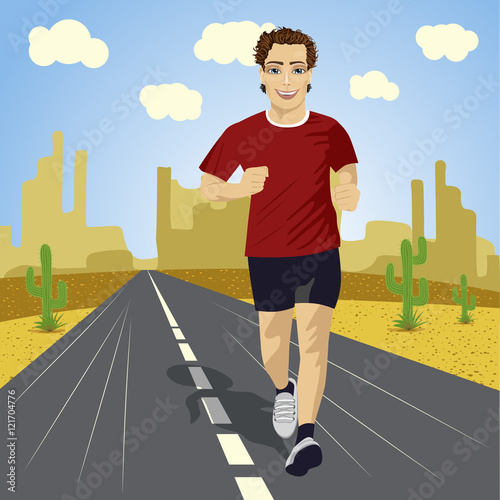 young sport man running on asphalt road in desert