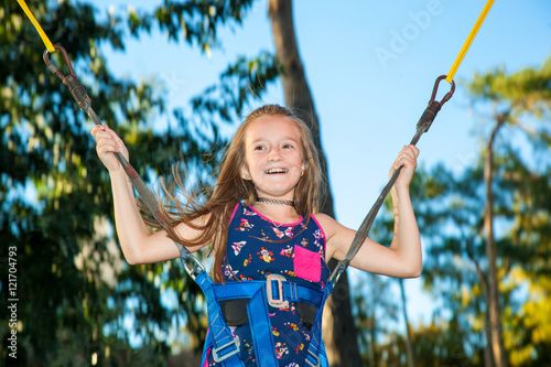 Girl jumping on a trampoline