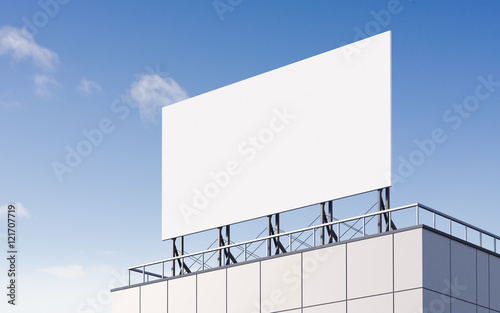 arge white billboard on the roof.