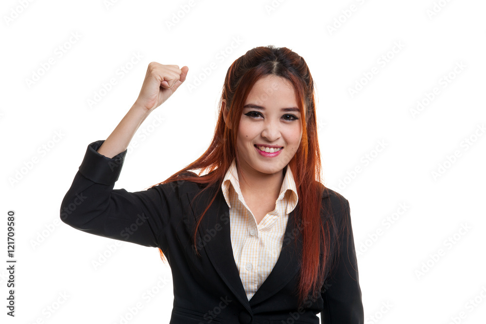 Successful young Asian woman hold fist up. Successful young Asian woman hold fist up.