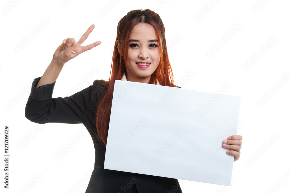 Young Asian business woman show victory sign with blank sign. Young Asian business woman show victory sign with blank sign.