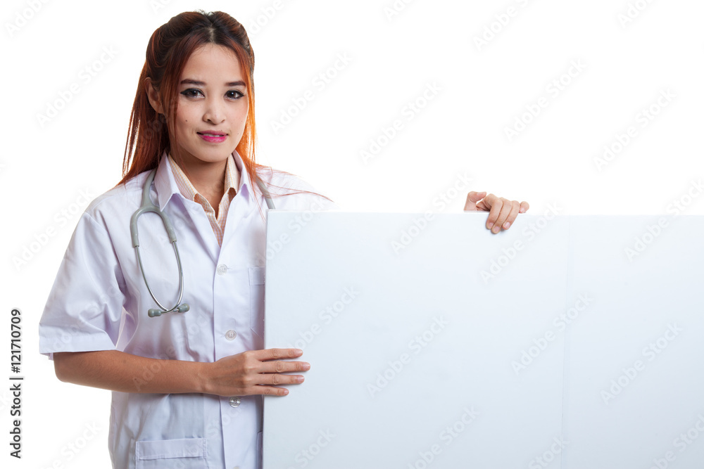 Young Asian female doctor hold a blank sign. Young Asian female doctor hold a blank sign.