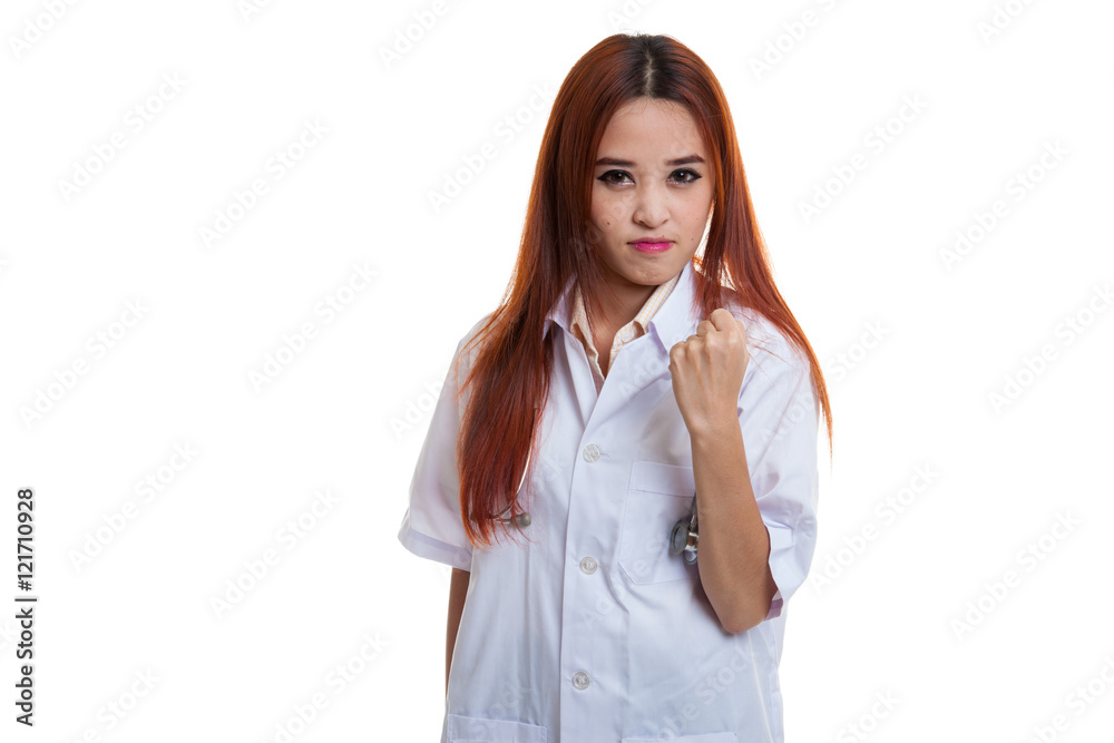 Portrait of confidence young female doctor hold fist. Portrait of confidence young female doctor hold fist.
