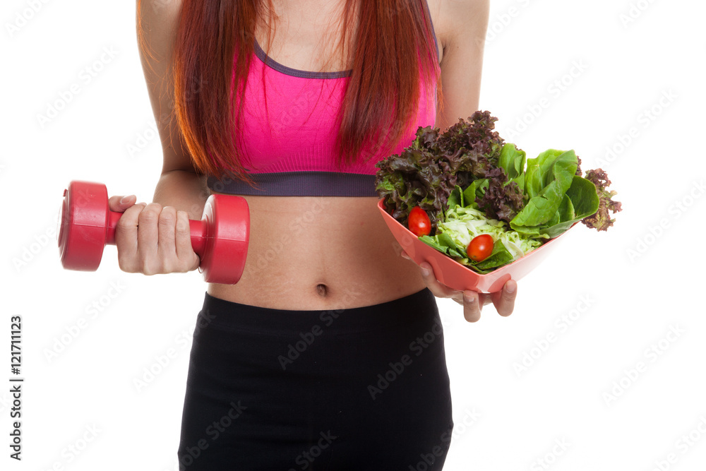 Asian healthy girl with dumbbell and salad. Asian healthy girl with dumbbell and salad.