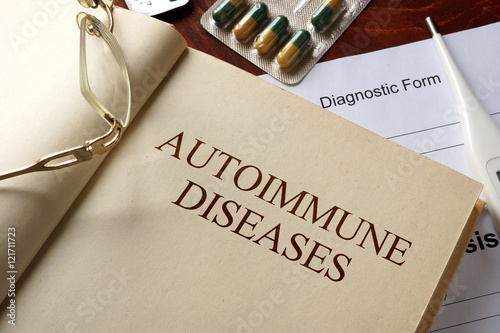 Book with diagnosis autoimmune diseases. Medic concept. photo