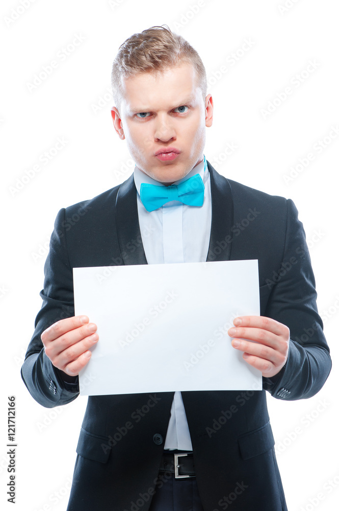 Holding blank with copy space. Portrait of young man with bowtie looking at camera. Isolated on white. Holding blank with copy space. Portrait of young man with bowtie looking at camera. Isolated on white.