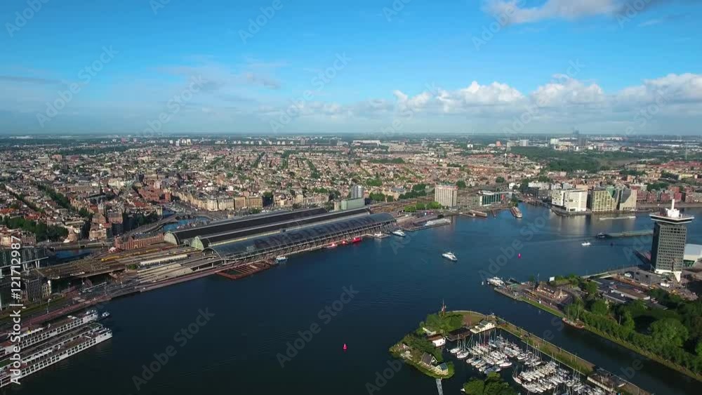 City aerial view over Amsterdam, The Netherlands. View from the bird's flight City aerial view over Amsterdam, The Netherlands. View from the bird's flight