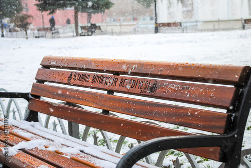 Photography Magnificent wooden bench in the square near the mosque of Aya Sofia