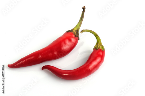 red chili peppers - hot spices on white background 