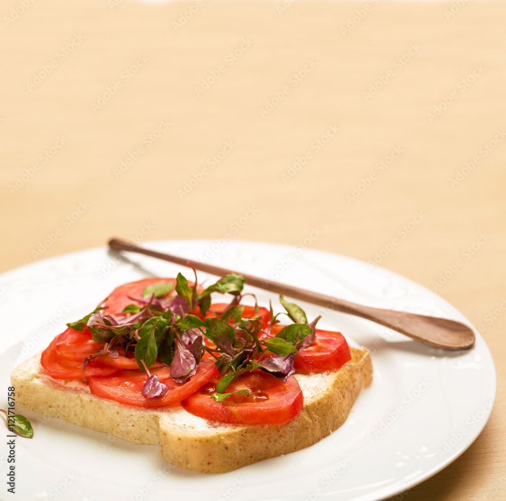 Clean food,  Watercress, Tomato slices and Whole Wheat Bread on wood background