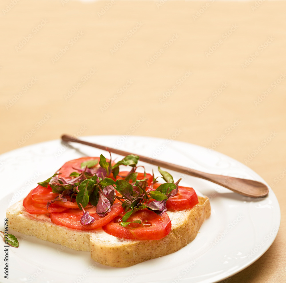 Clean food, Watercress, Tomato slices and Whole Wheat Bread on wood background Clean food, Watercress, Tomato slices and Whole Wheat Bread on wood background