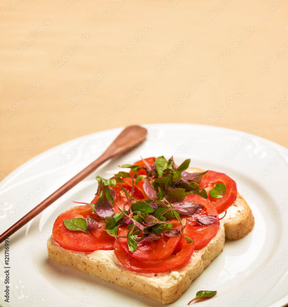 Clean food, Watercress, Tomato slices and Whole Wheat Bread on wood background