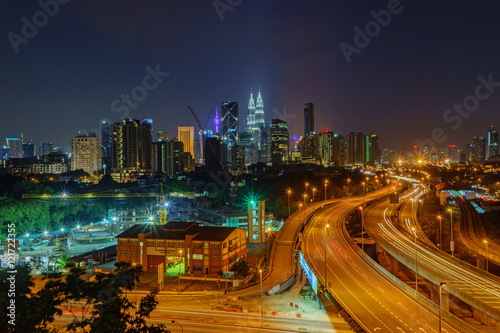 Dramatic scenery of elevated highway heading towards Kuala Lumpur city centre at night