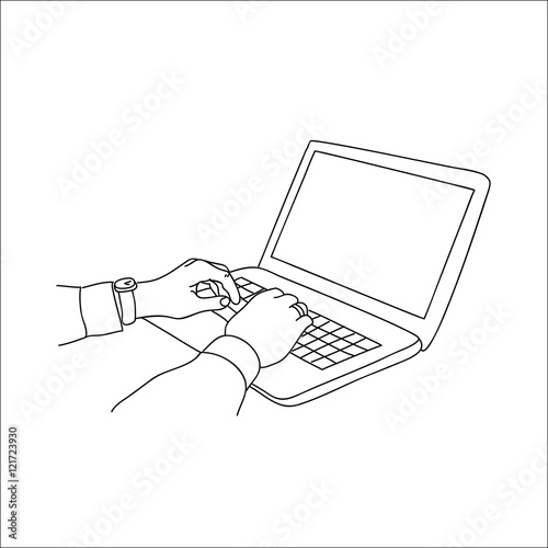 Human hands typing on a laptop keyboard