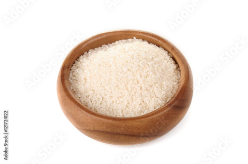 broken rice in a wooden bowl. for healthy cooking ingredient