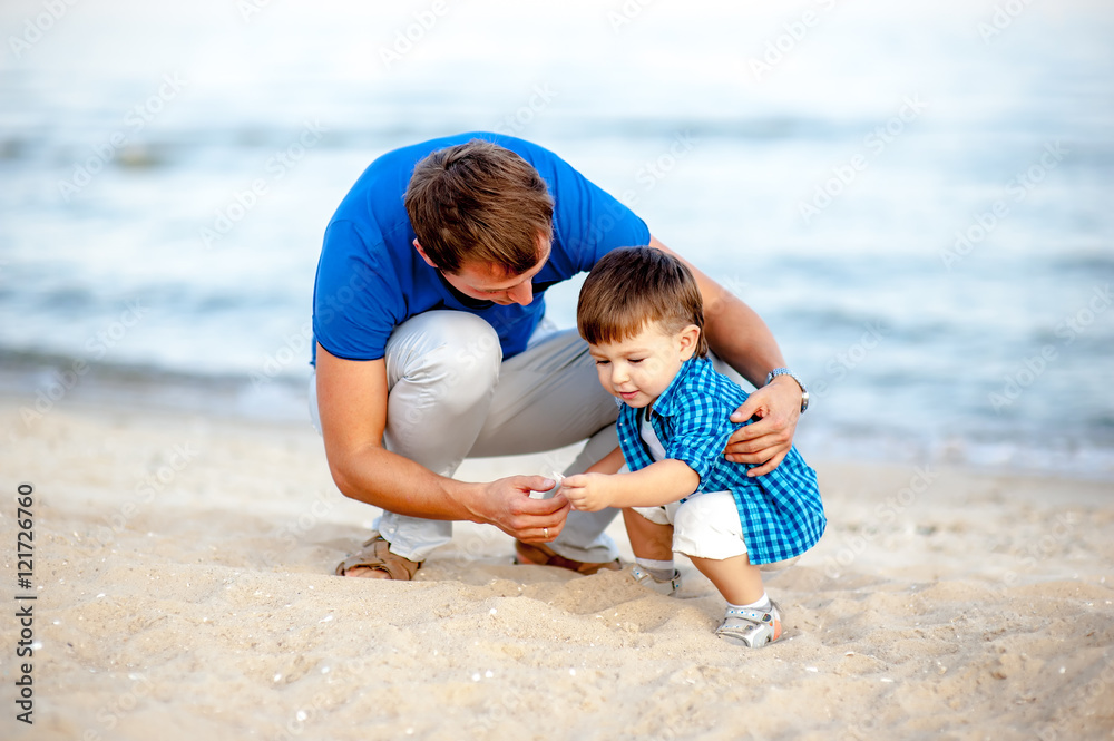 Family resting on the sea and have fun on a bright sunny day Family resting on the sea and have fun on a bright sunny day