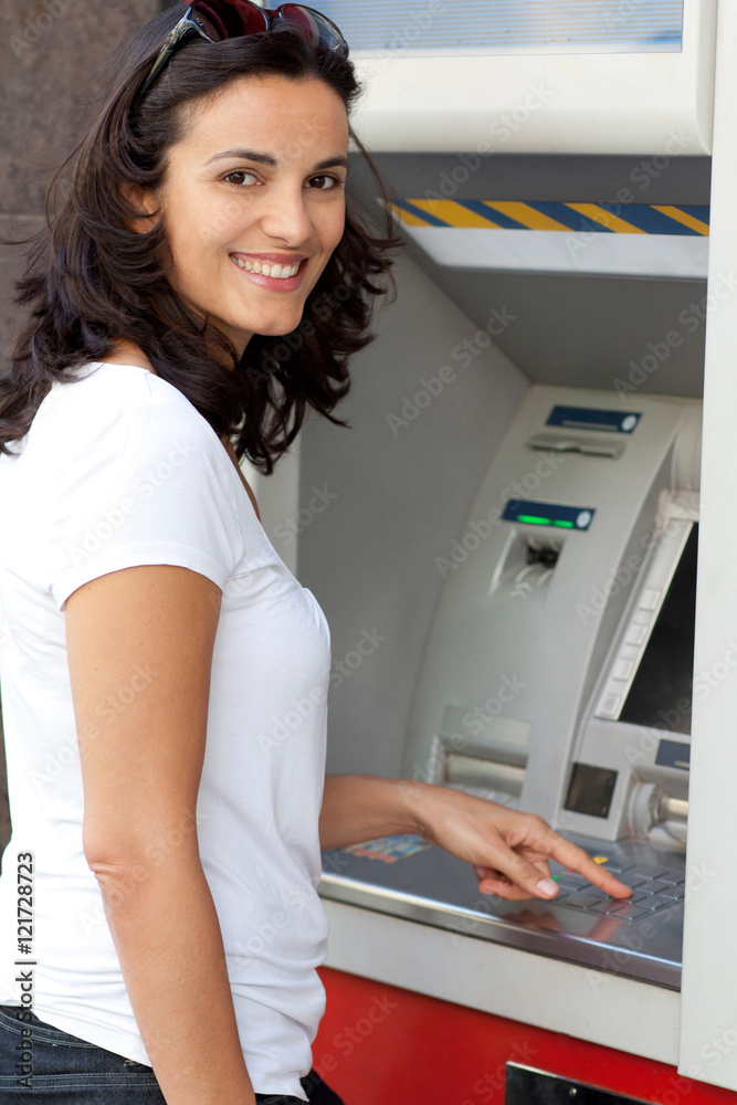 Latin woman at ATM Latin woman at ATM
