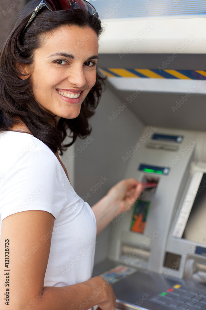 Latin woman at ATM Latin woman at ATM