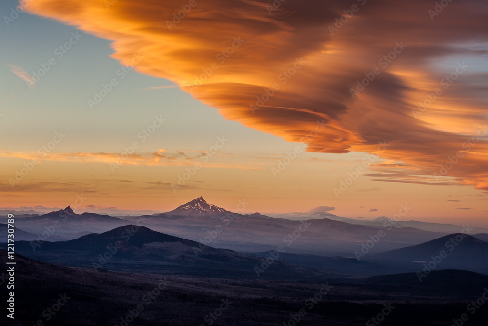 Lenticular clouds over the mountains of central Oregon