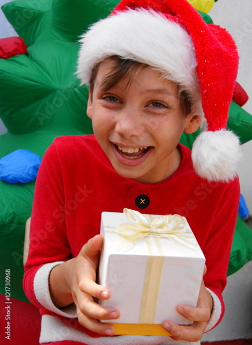 happy boy with christmas gift
