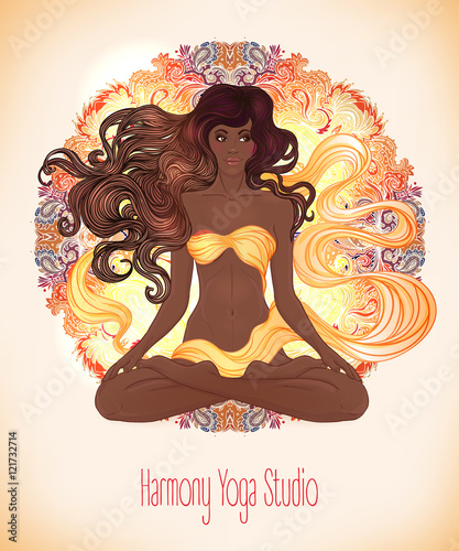 Beautiful African American Girl sitting in Lotus pose with ornat