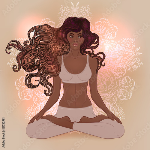 Beautiful African American Girl sitting in Lotus pose with ornat